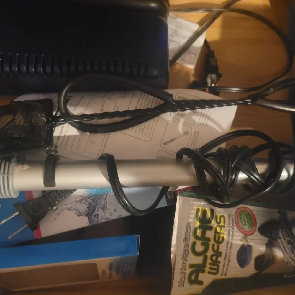 55 gallon fish tank, supplies, and accessories.